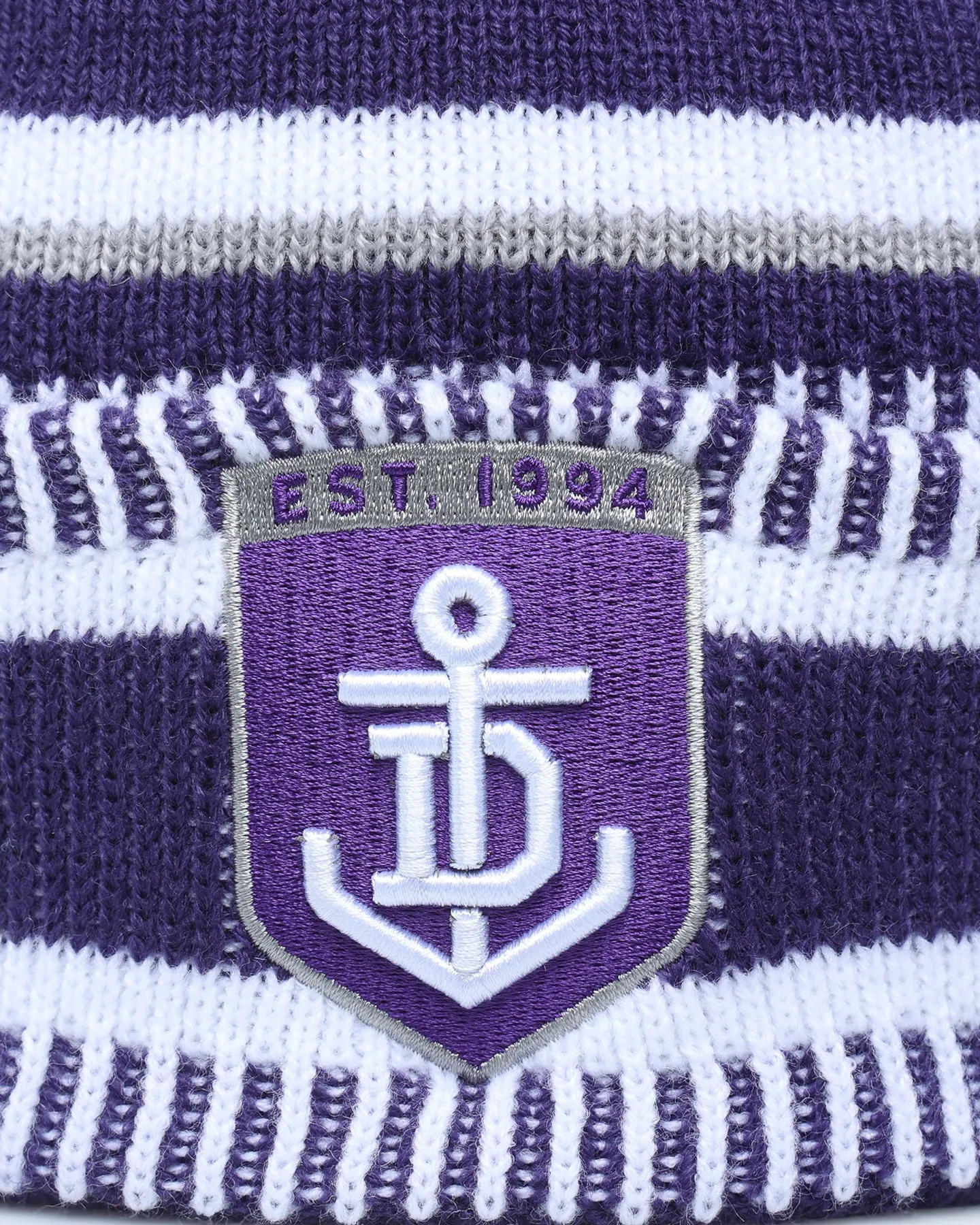 New Era Fremantle Dockers AFL Opening Bounce 2022 Pom Wordmark Beanie Purple